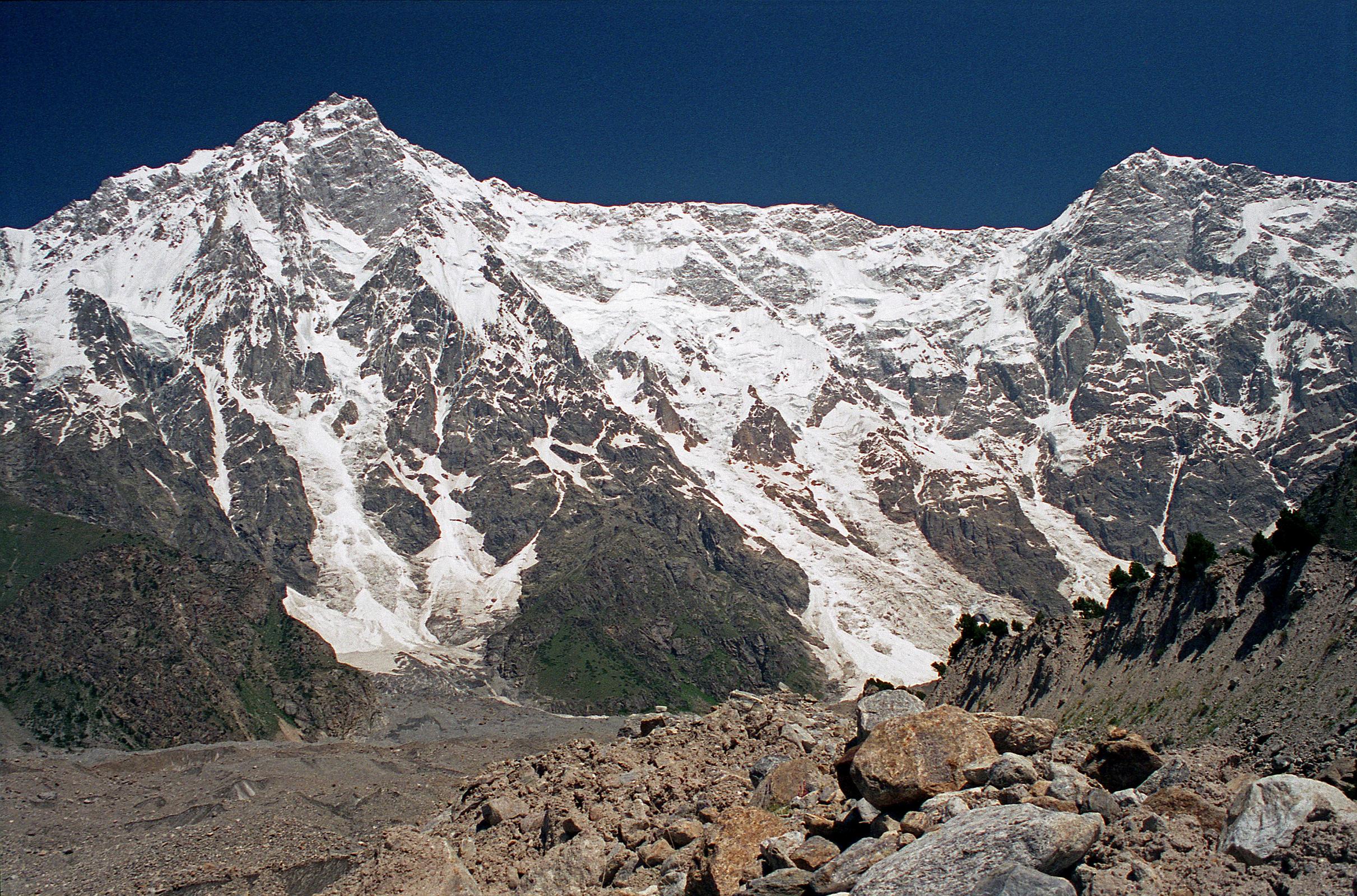 19 Nanga Parbat Rupal Face And Rakhiot Peak From Bazhin Glacier Just Past Rupal Face Base Camp We walked a little farther from Herligkoffer Base Camp (3656m) onto the Bazhin Glacier with the Nanga Parbat Rupal Face and the ridge to Rakhiot Peak towering above. Gunther Messner letter home June 15, 1970: To the north, directly above us, is the Rupal Flank � 4500m to the summit. It is unbelievably impressive. (The Naked Mountain by Reinhold Messner)